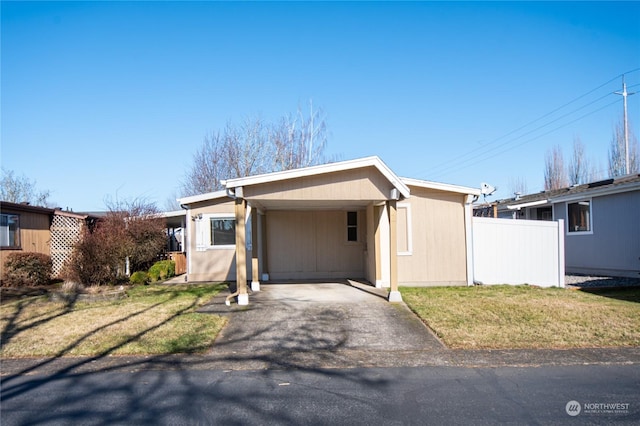 14204 NE 10th Ave Unit 2, Vancouver, WA 98685 - view of front of house with a carport and a front yard