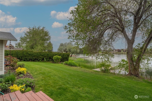 view of yard with a water view