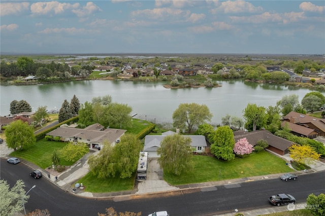 birds eye view of property featuring a water view