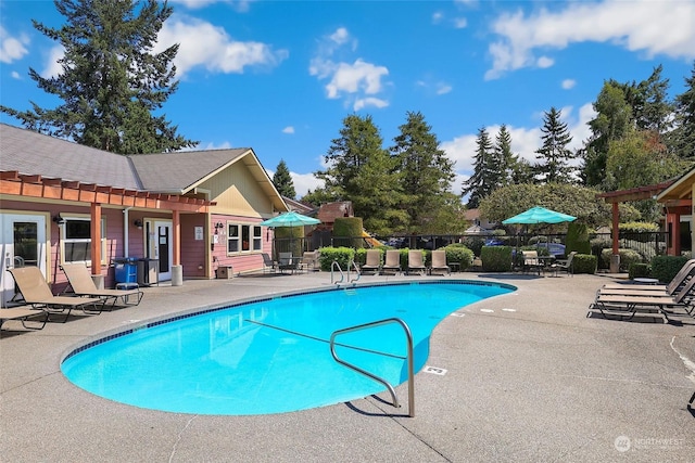 view of pool featuring a patio and a pergola