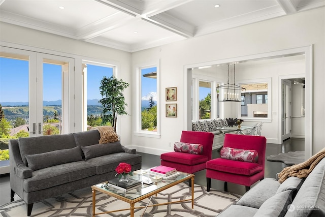 sunroom with a healthy amount of sunlight, beam ceiling, french doors, and coffered ceiling