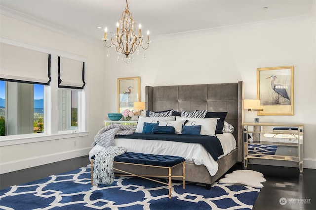 bedroom featuring crown molding, a chandelier, and dark hardwood / wood-style floors