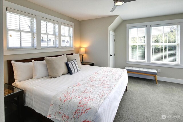 bedroom featuring a ceiling fan, carpet flooring, and baseboards