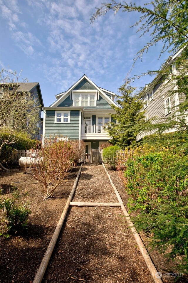 view of front of property with a balcony