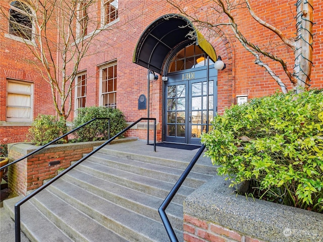 doorway to property featuring french doors