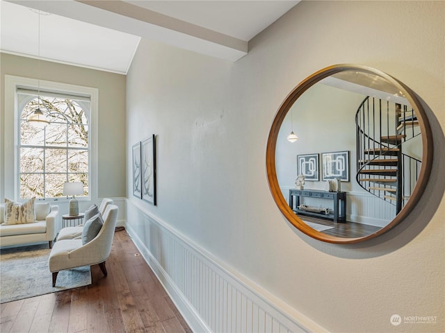 living area with hardwood / wood-style flooring