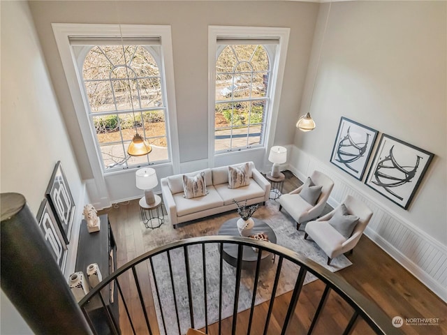 living room featuring hardwood / wood-style flooring and a healthy amount of sunlight