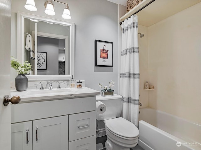 full bathroom featuring vanity, shower / bath combination with curtain, and toilet