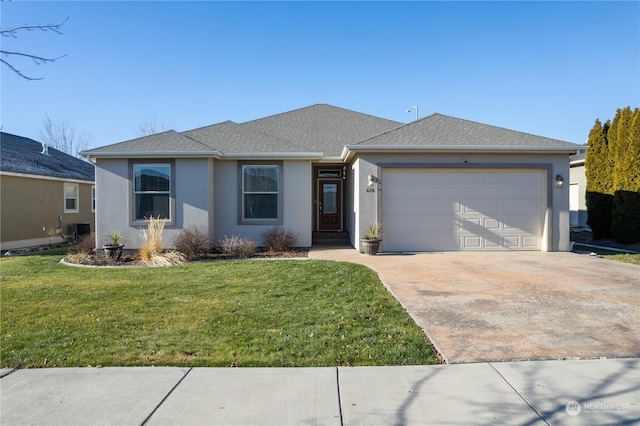 ranch-style home with a garage, a front yard, and cooling unit