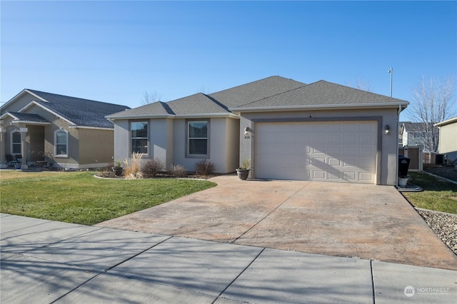 ranch-style house featuring a garage and a front yard