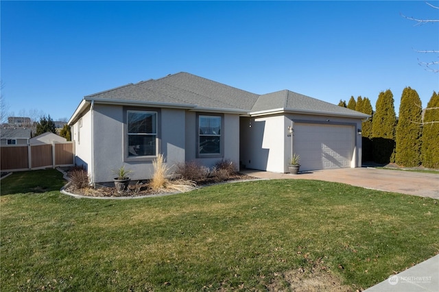 view of front facade with a garage and a front yard