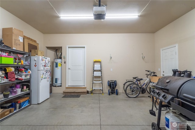 garage with white refrigerator, a garage door opener, and electric water heater