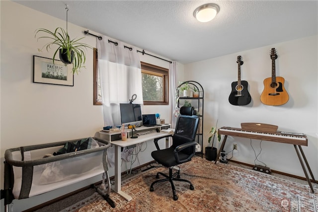 home office with a textured ceiling