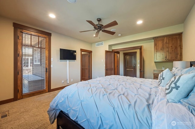 carpeted bedroom with ceiling fan