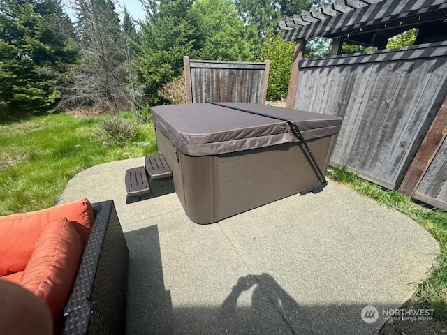 view of patio featuring a hot tub