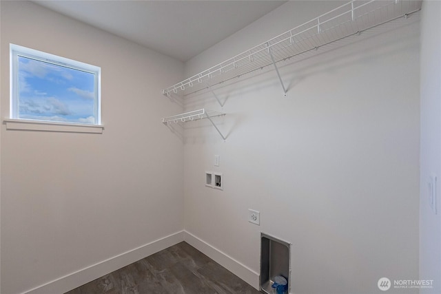 laundry room with laundry area, baseboards, dark wood-type flooring, hookup for a washing machine, and hookup for an electric dryer