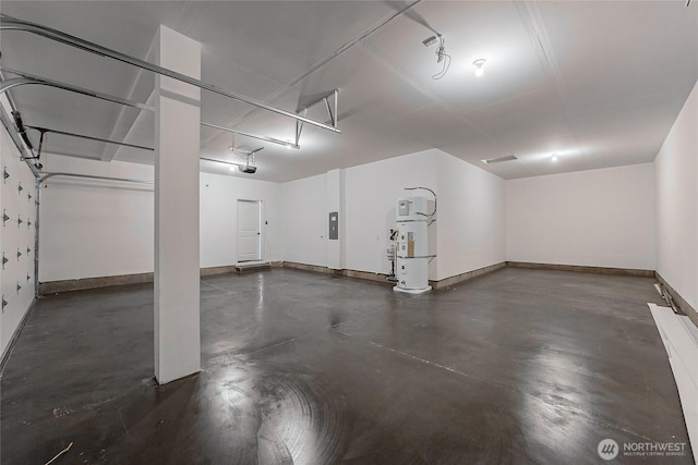 garage featuring electric panel, water heater, baseboards, and a garage door opener