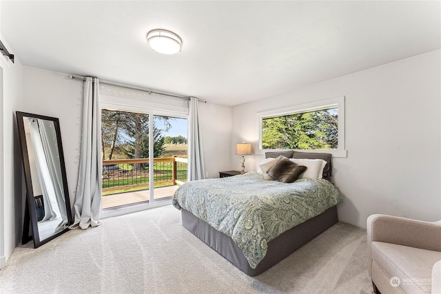 12504 SW 232nd St, Vashon, WA 98070 - carpeted bedroom featuring access to outside and multiple windows