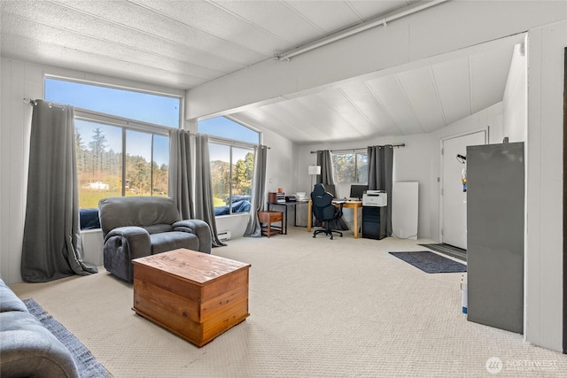 office featuring vaulted ceiling with beams and carpet