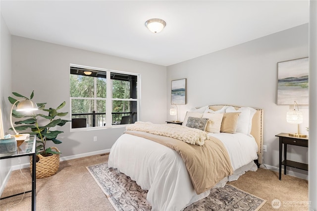 carpeted bedroom with baseboards