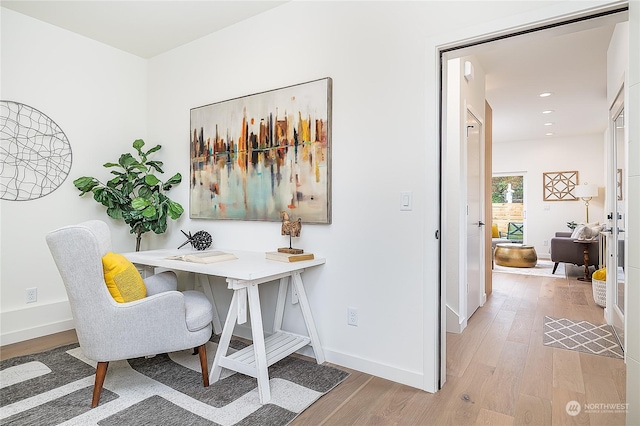 office area with hardwood / wood-style floors