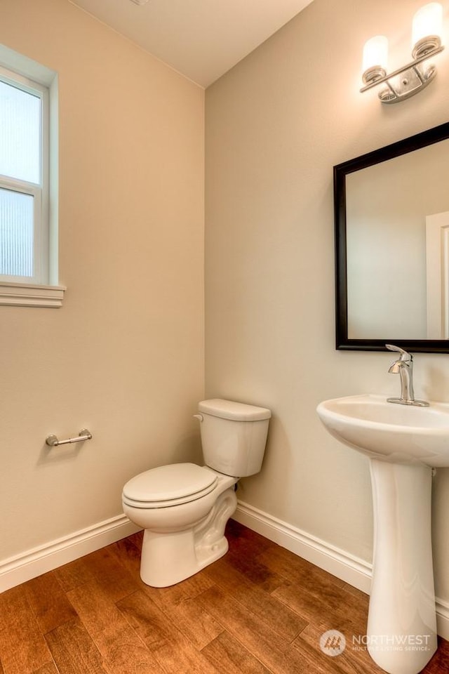 bathroom featuring sink and toilet