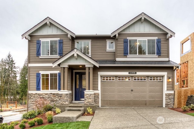 craftsman-style home featuring a garage