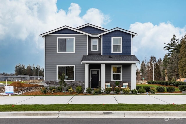 craftsman-style home featuring covered porch