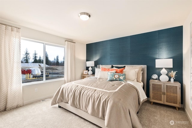 bedroom featuring carpet