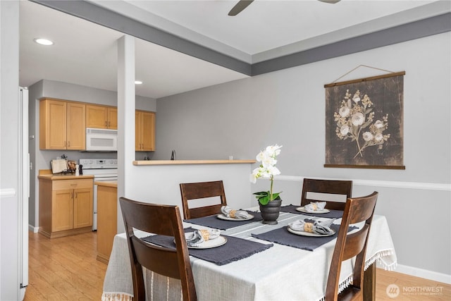 dining area with recessed lighting, a ceiling fan, light wood-type flooring, and baseboards