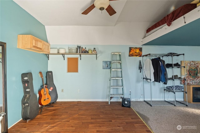 interior space with dark hardwood / wood-style floors and ceiling fan