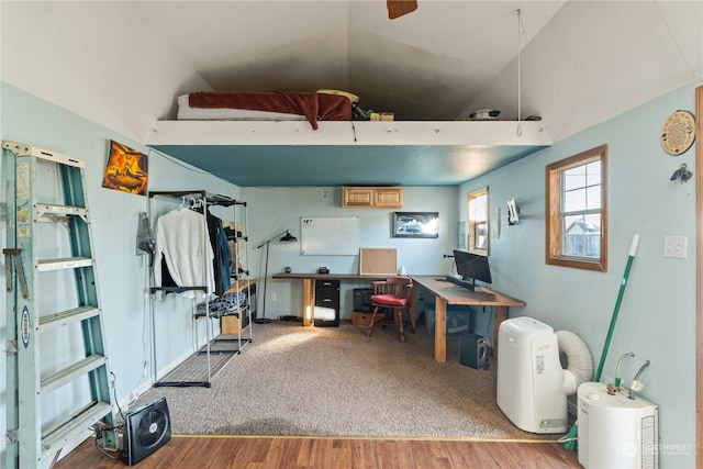 office space featuring lofted ceiling and hardwood / wood-style floors