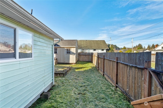 view of yard with a storage shed