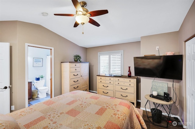 bedroom with lofted ceiling, ensuite bath, and ceiling fan