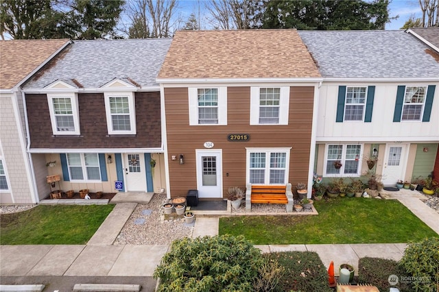 view of front of home with a front yard