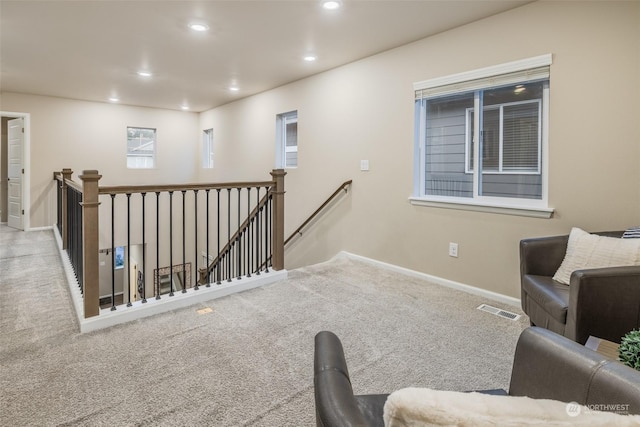 interior space with light colored carpet