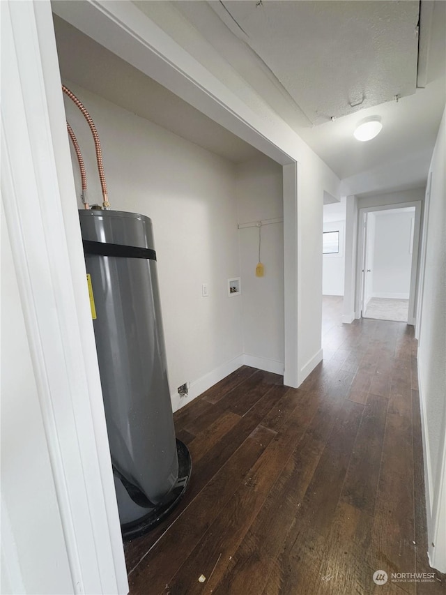 interior space featuring dark hardwood / wood-style flooring and secured water heater