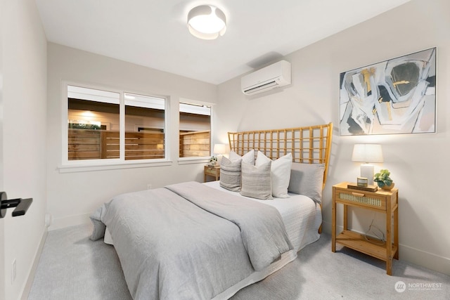 carpeted bedroom featuring an AC wall unit