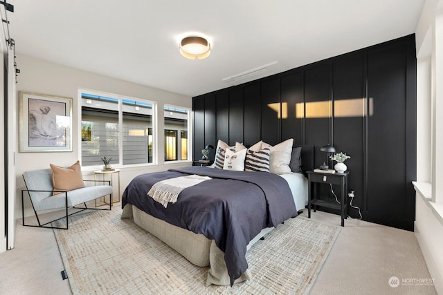 bedroom featuring light carpet