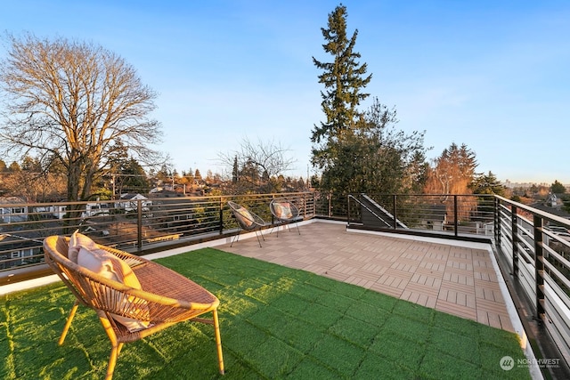 view of yard with a balcony and a patio area