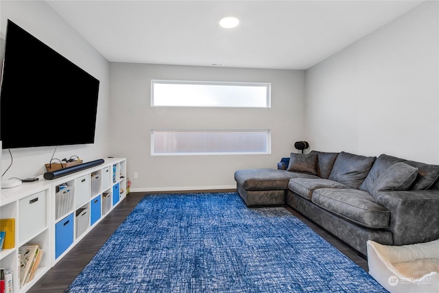 living room with dark wood-type flooring