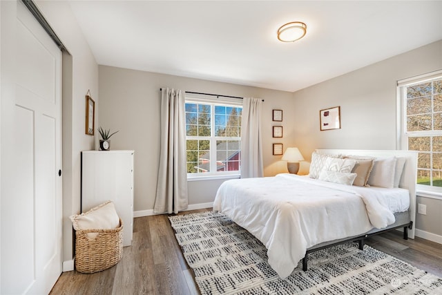 bedroom featuring hardwood / wood-style flooring