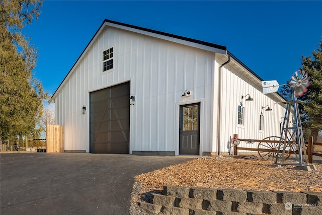 view of outbuilding with a garage