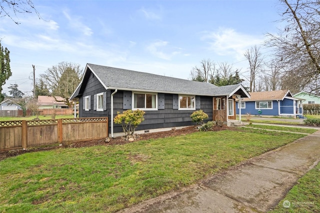 single story home featuring a front yard