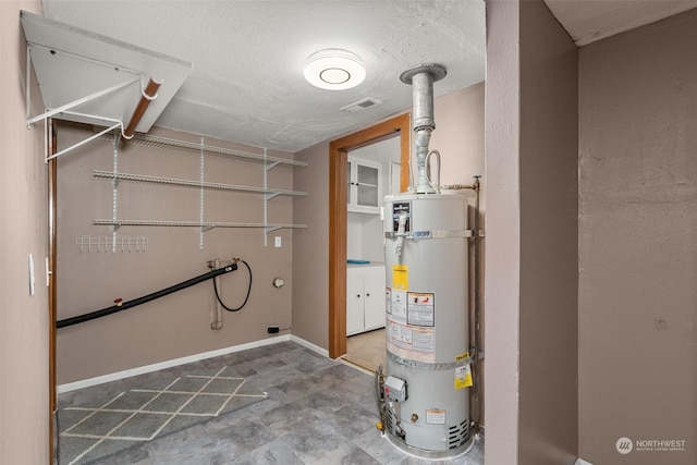 utility room with water heater