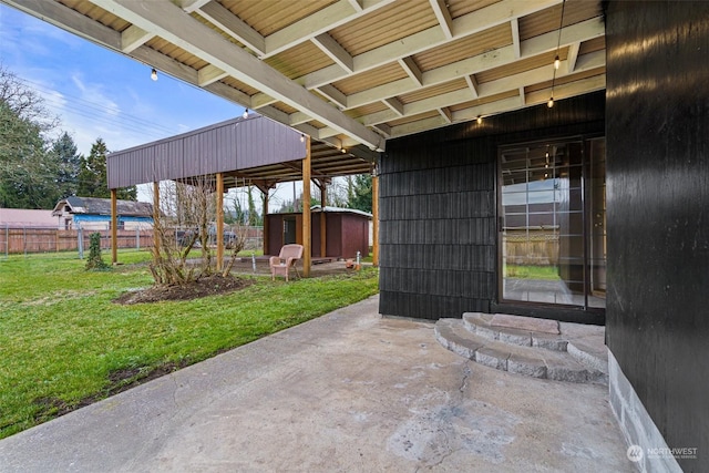 view of patio with an outdoor structure