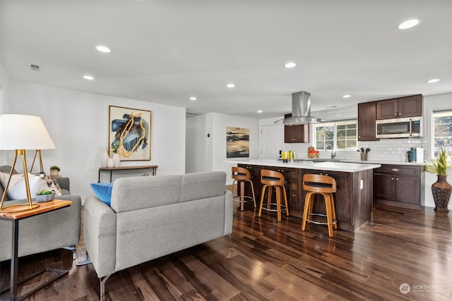 living room featuring dark hardwood / wood-style floors