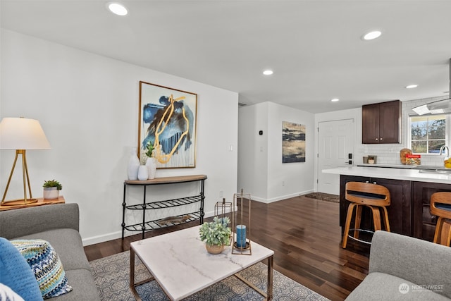 living room featuring dark hardwood / wood-style flooring