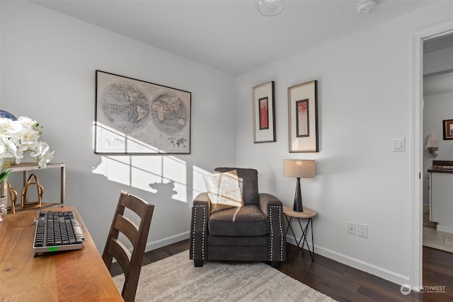 living area featuring dark hardwood / wood-style floors