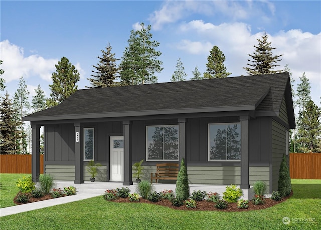 view of front of property with a porch and a front lawn